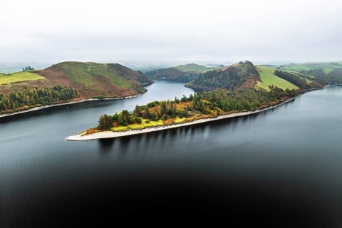 Autumn colours over Llyn Clywedog and Clywedog Reservoir from a drone, Llanidloes, Wales, UK
