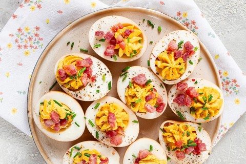 Spicy, stuffed ramen eggs, with bacon and green onions, homemade, no people