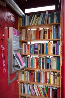 British red telephone box used as a book exchange, Hachenburg, Westerwaldkreis in