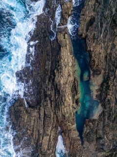 Top view image of the rugged coastline at Tindaya Beach, Fuerteventura, showcasing the stunning