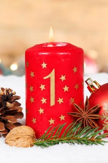 First 1st Advent with candle Christmas decoration Christmas card for Christmas time with copy space