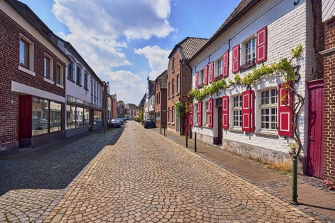 Old town, historic town center, historic brick buildings, buildings, houses, street, barrier