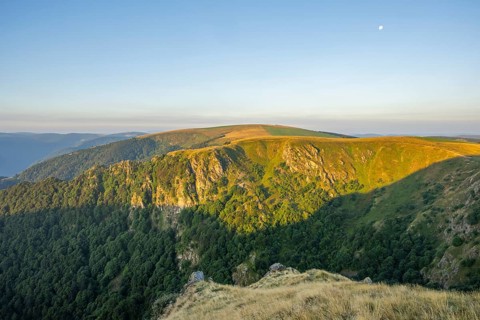 The first rays of sunshine at Mount Hohneck in the Vosges Mountains, France