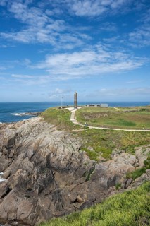 Coastal landscape at Pointe Saint-Mathieu with a view of the national sailor's monument at Cape