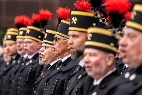 The Ruhrkohle Choir, Bergmannschor, in traditional miner dress with mountain smock and chess hat