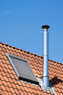 Detail of a house roof, window with closed shutters, ventilation pipe, detail, sky, Westphalia,