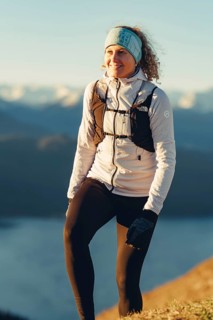 Trail running in autumn on the Jochberg on Lake Walchensee against the wonderful backdrop of the