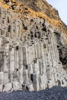 Iceland, landscape near Dyrhólaey with basalt columns on Reynisfjara beach