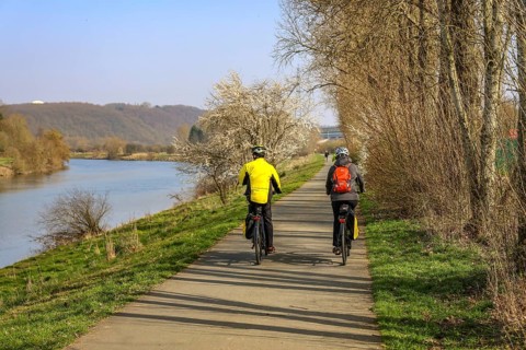 Hattingen, North Rhine-Westphalia, Germany - Ruhr countryside, cyclists on the Ruhr promenade