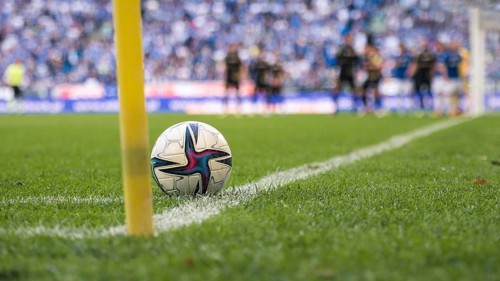 Ball in the corner of football pitch in Poznan, Poland