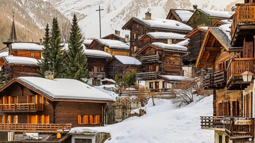 Snow-covered old farmhouses, large wooden cross, historic town center, Grimentz, Val d'Anniviers,