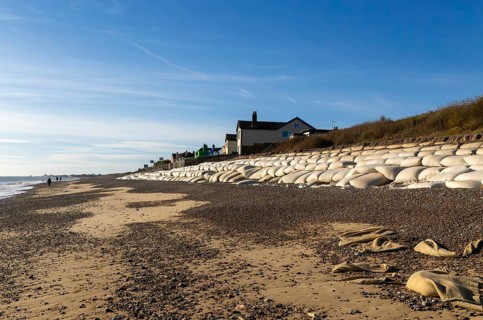 Clifftop houses at risk from coastal erosion, Thorpeness, Suffolk, North Sea coast, England, UK