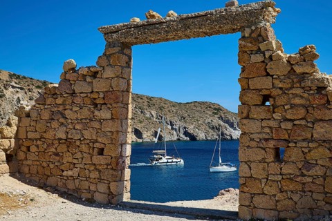 Ancient ruin with view of sailboats in front of blue sea, Palio Ergostasio Kaolini, Old Kaolin