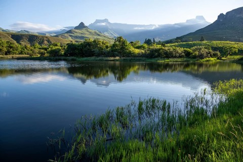 Amphitheatre with reflection in the lake, Royal Natal National Park, Drakensberg Mountains south,