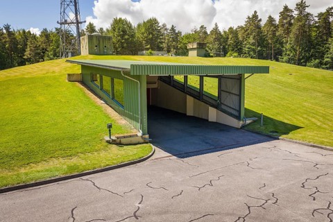 Bunker entrance to a hill covered with grass, Bunker Anlage, Calw, Germany