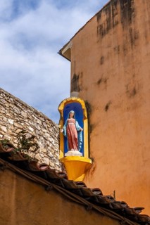 Wayside shrine with Madonna on a house façade in the old town of Aix-en-Provence, Bouches-du-Rhone,