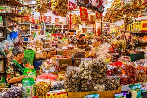 Customers in a grocery store, Kad Luang Warorod Market, Chiang Mai Thailand
