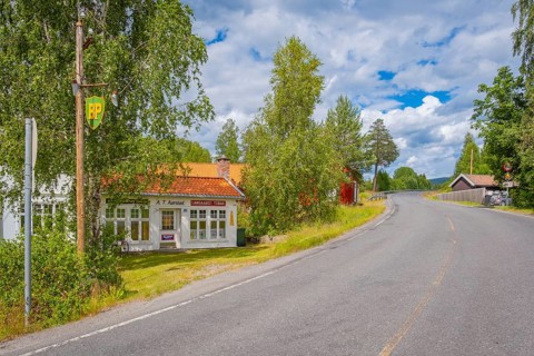 View along a street of an old gas station, Nedre Eggedal, Buskerud Gleiche