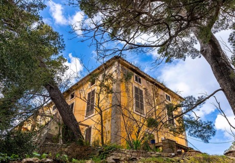 Urban architecture and house facades in the picturesque mountain village of Valdemossa, Majorca,