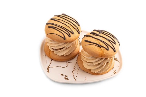 Caramel Cream Cakes isolated on white background, side view, close up