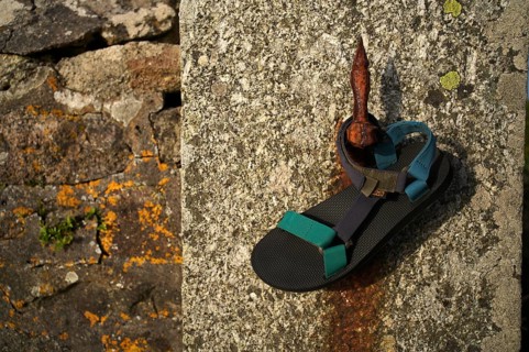 Lost shoe, bath shoe, slippers, hanging on hook, Cape Cape Cornwall, St Just in Penwith, Cornwall,