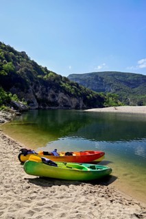 Canoes on the banks of the Ardèche River, Ardèche Gorge, Gorges de l'Ardèche, Vallon-Pont-d'Arc,