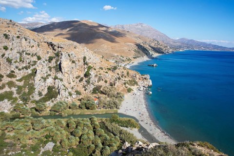 Preveli beach, palm beach on the Megalopotamos or Kourtaliotis river, in the back the Lefka Ori or