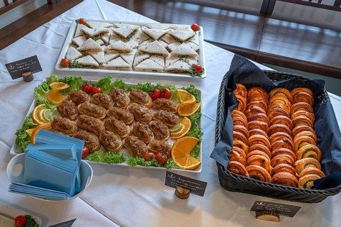 Various canapés and poppy snails decorated on plates, Bavaria, Germany