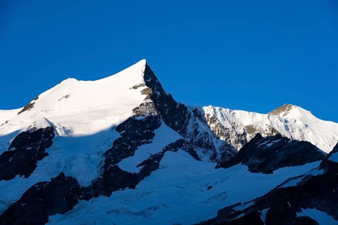 Impressive high-alpine landscape, Kleines Fiescherhorn Ochs mountain summit, Bernese Alps, Bernese