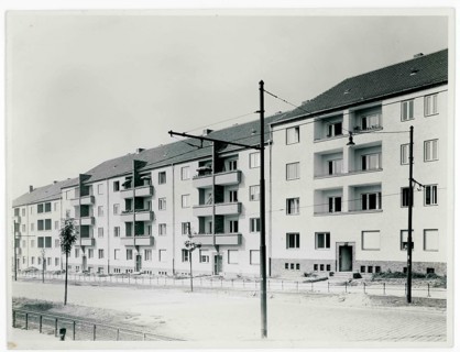 1930s residential buildings, Berlin, row of newly built residential buildings along a quiet street,