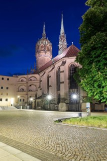 Atmospheric night view, courtyard of the castle with castle church and church tower, Luther city