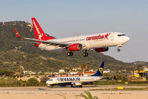 Boeing 737-800 Corendon Airlines and Ryanair aircraft with license plate 9H-CXD at Rhodes airport,