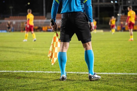 Assistant of football referee during the match in Glogow, Poland