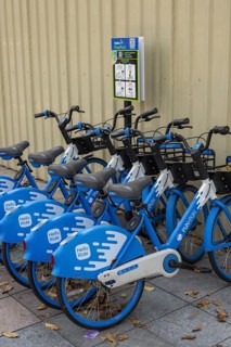 A series of Hello PunPun rental bikes, the blue and white wheels are properly available and show