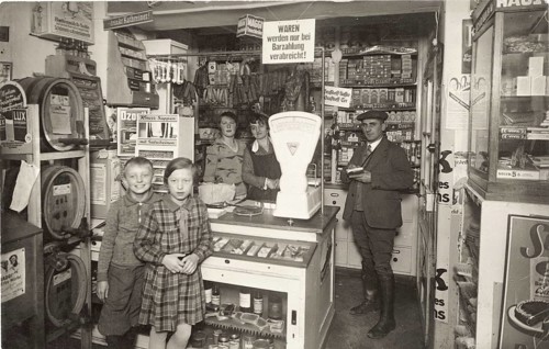 Drugstore, shop for everything, beer kegs, saleswoman, colonial goods, village shop, business,