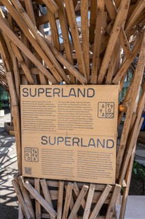 Wooden sculpture on the theme of nature and land in front of the Futurium Museum on Kapelle Ufer,