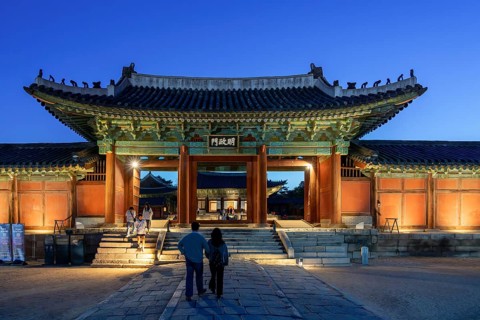 Myeongjeongmun Gate illuminated at dusk, entrance to the main hall of the 15th century