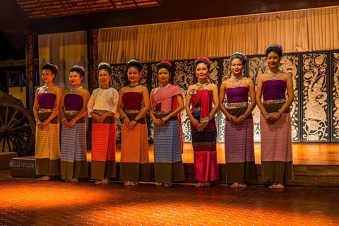 A dance group of young Thai women says their goodbyes to the audience, Old Chiang Mai Cultural