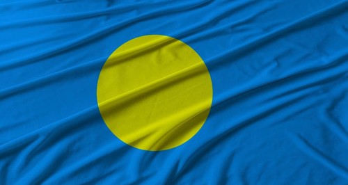 Palau flag waving. Flag of Palau with cloth texture