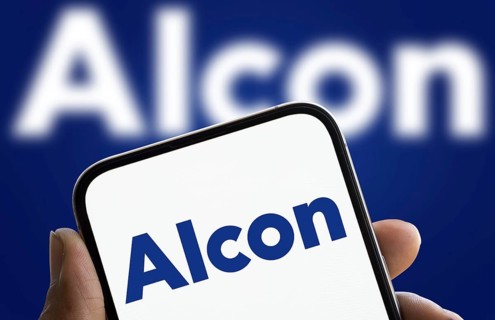 Alcon logo is displayed on smartphone. Alcon Inc. is a Swiss-American pharmaceutical and medical