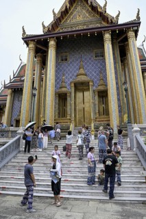 Tourists at Wat Phra Kaew, Temple of the Emerald Buddha, Bangkok, Thailand