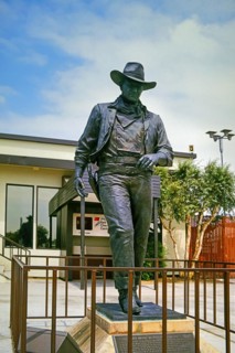 John Wayne statue in front of John Wayne Airport, Orange County, Los Angeles