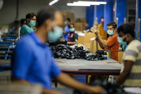Employees of Inter Market Knit Private Limited producing socks. Lahore, 22.08.2024. Photographed on