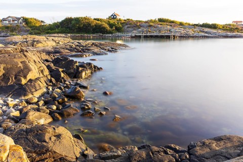 The typical cut rocks of the archipelago on the west coast with views of the North Sea, Lerkil,