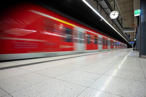 Underground incoming S-Bahn, train, class 420 in traffic red, platform, stop, Feuersee station,