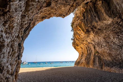 Rock cave on the beach at Cala Luna, Golfo di Orosei, Baunei, Sardinia, Italy