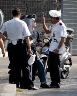 Rome, 08.09.2004 Italian police teach a motorcyclist in Rome, Rome, Italy