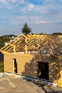 Shell of a wooden house, building, completely made of wood, in the village of Hesborn, in