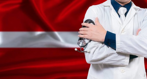 Latvian national health system, Medical professional holding sthetoscope isolated