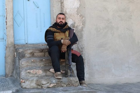 In Aleppo, Syria on January 10, 2026, Syrian Army soldiers deploy throughout the Sheikh Maqsoud and